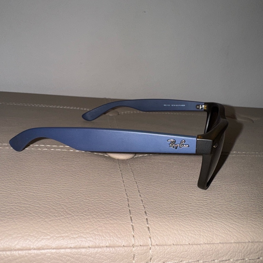 Ray-Ban New Wayfarer RB2132 sunglasses: tortoise frame w/ deep blue temples 55mm